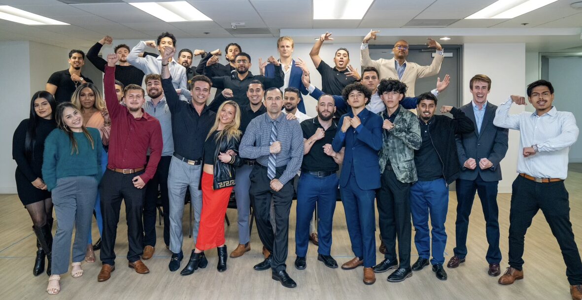 The WARCOX team gathered together on the sales floor.